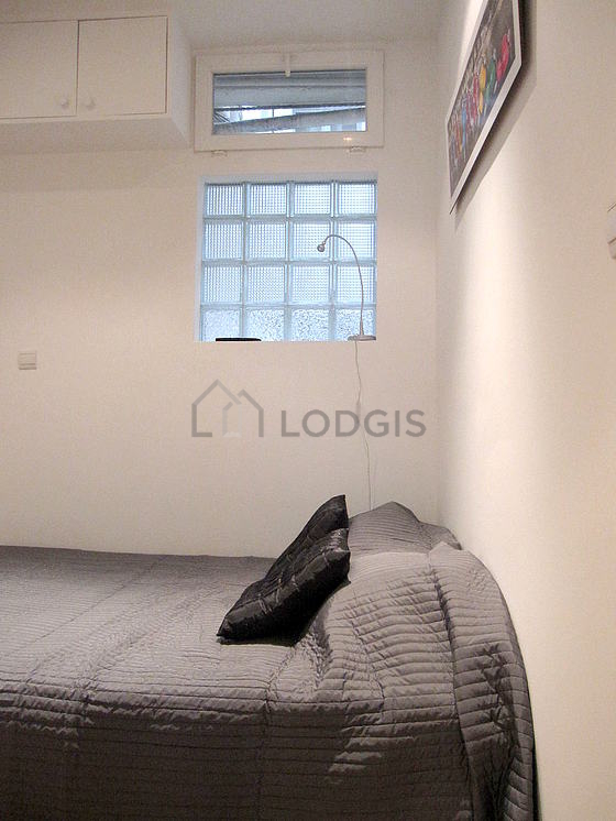 Bedroom with wooden floor