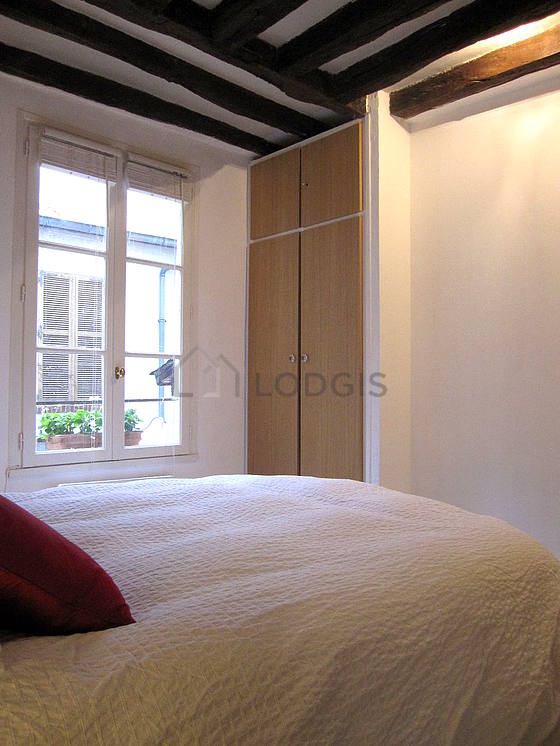 Bedroom with double-glazed windows facing the courtyard