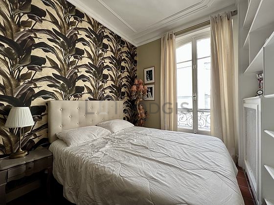 Bedroom with floor tiles floor