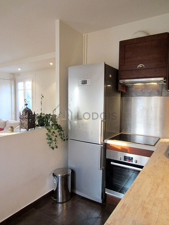 Very bright kitchen with double-glazed windows facing the road