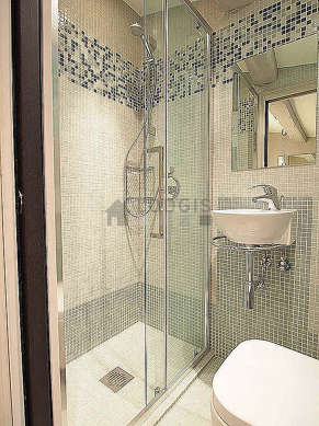 Pleasant and very bright bathroom with tile floor