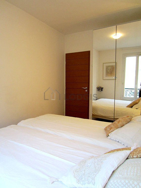 Bedroom with wooden floor