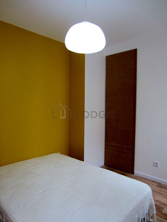 Bedroom with double-glazed windows facing the road