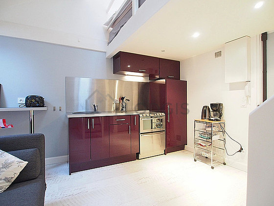 Kitchen equipped with dishwasher, hob, refrigerator, freezer
