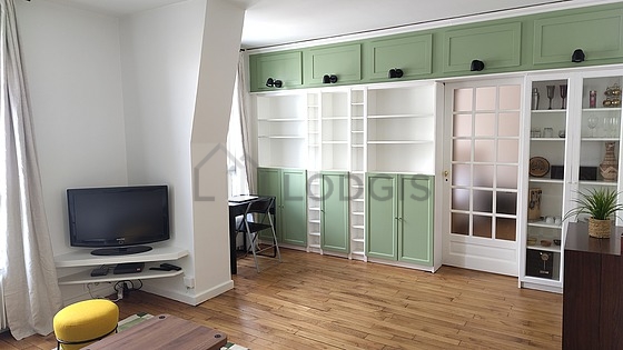 Quiet living room furnished with 1 sofabed(s) of 140cm, tv, dvd player, cupboard