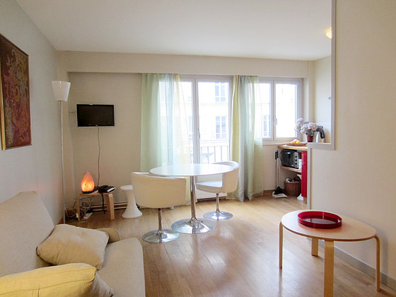 Living room with double-glazed windows facing the road