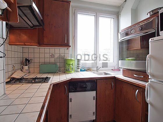 Kitchen where you can have dinner for 3 person(s) equipped with dishwasher, hob, refrigerator, extractor hood