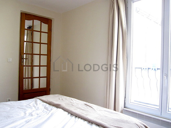 Bedroom with wooden floor
