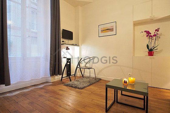 Very quiet living room furnished with 1 bed(s) of 140cm, tv, wardrobe, cupboard