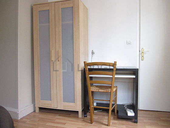 Bright bedroom equipped with desk, wardrobe, cupboard, 1 chair(s)