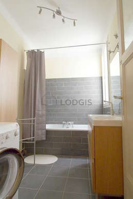 Pleasant and bright bathroom with double-glazed windows and with tilefloor