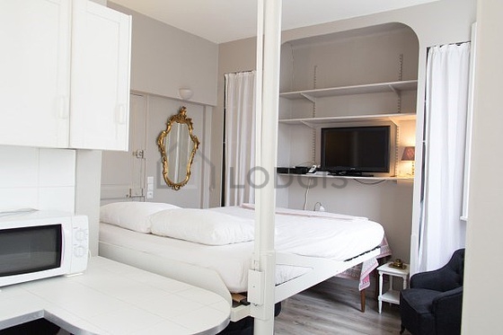 Very quiet living room furnished with 1 loft bed(s) of 140cm, tv, wardrobe, cupboard