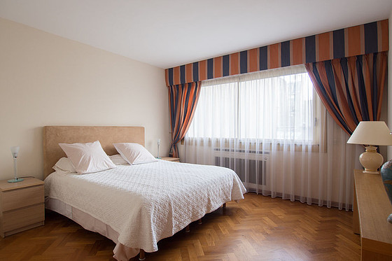 Bedroom with wooden floor
