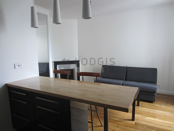 Kitchen equipped with washing machine, refrigerator, extractor hood, crockery
