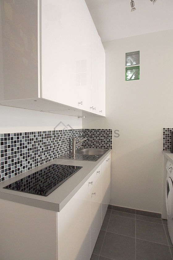 Kitchen where you can have dinner for 2 person(s) equipped with washing machine, refrigerator, freezer, crockery