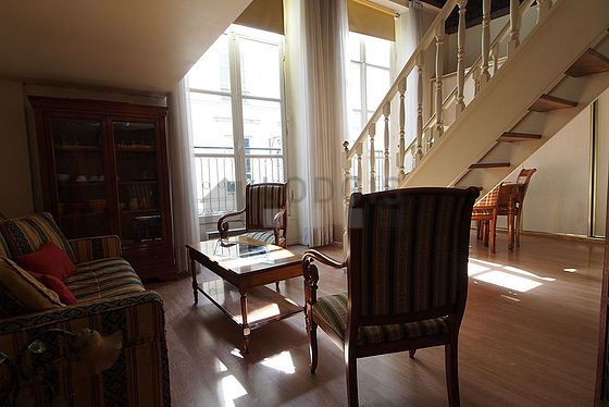 Living room with windows facing the road
