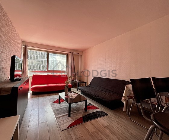 Living room with windows facing the road