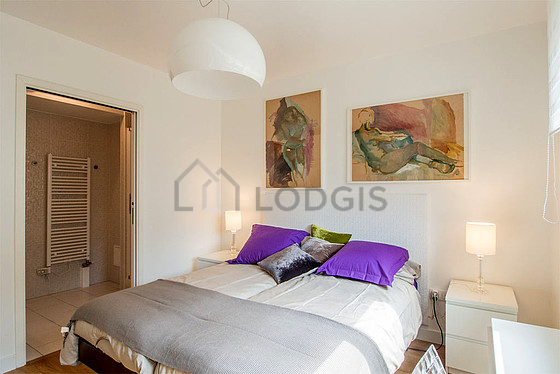Bedroom with wooden floor