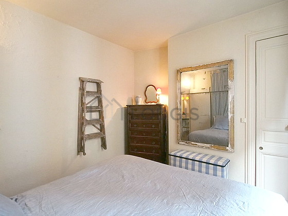 Bedroom with wooden floor