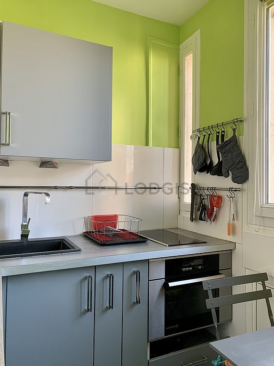 Kitchen where you can have dinner for 2 person(s) equipped with washing machine, dryer, refrigerator, freezer