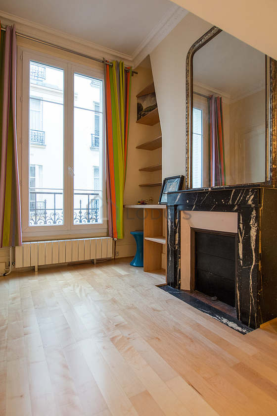 Bedroom with wooden floor