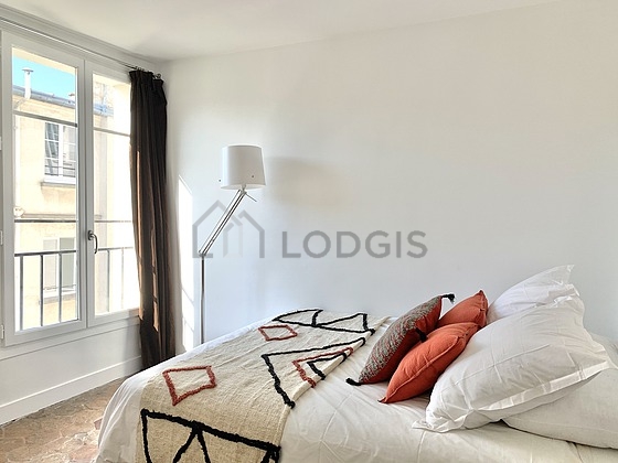 Bedroom with double-glazed windows facing the courtyard