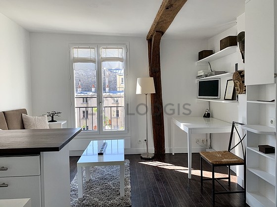 Living room with double-glazed windows facing the courtyard