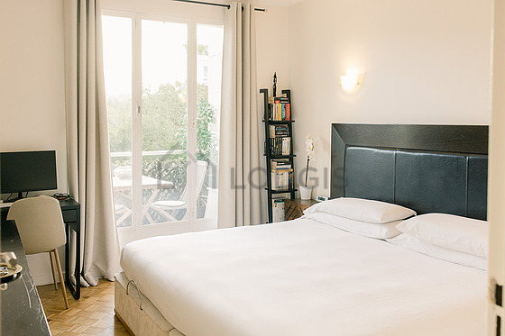 Bedroom with wooden floor