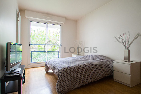 Bedroom with wooden floor