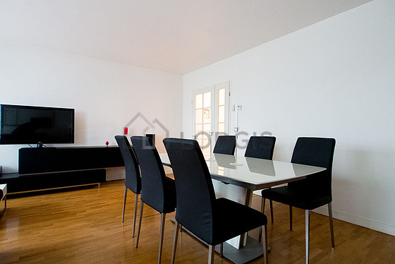 Living room with double-glazed windows facing the garden