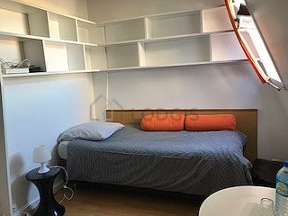 Very quiet living room furnished with 1 bed(s) of 90cm, tv, wardrobe, cupboard