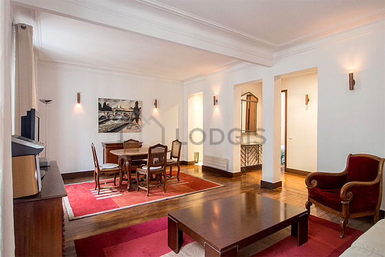 Living room with double-glazed windows facing the road