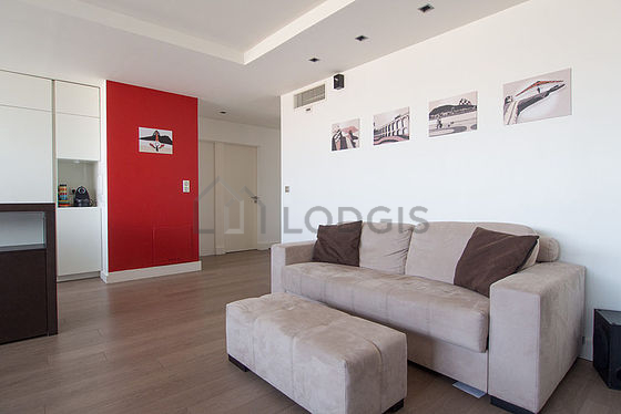 Very bright living room furnished with cupboard, 4 chair(s)