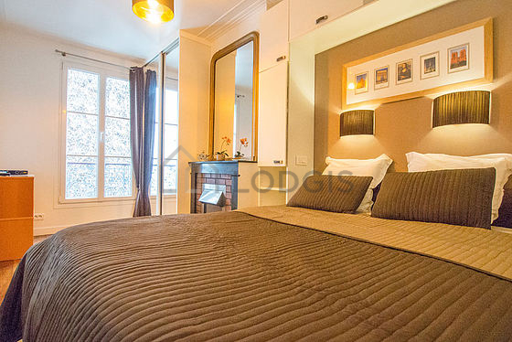 Bedroom with double-glazed windows facing the courtyard