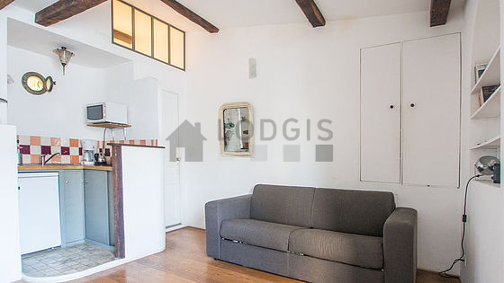 Quiet living room furnished with 1 sofabed(s) of 140cm, tv, fan, 2 chair(s)