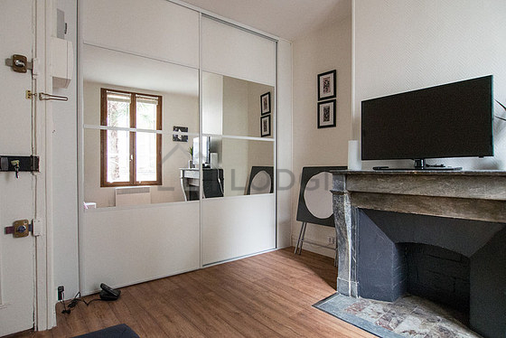 Living room with double-glazed windows facing the courtyard