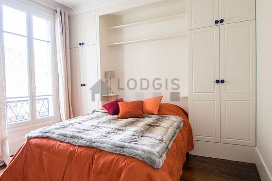 Bedroom with double-glazed windows facing the courtyard