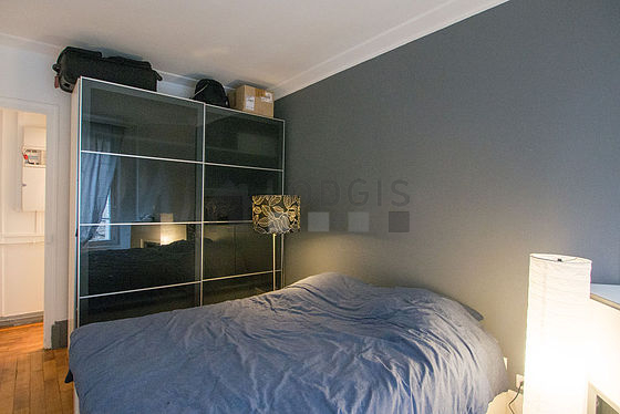 Bedroom with wooden floor