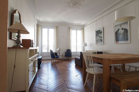 Living room with double-glazed windows facing the road