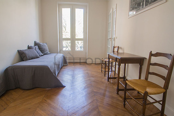 Bedroom with wooden floor