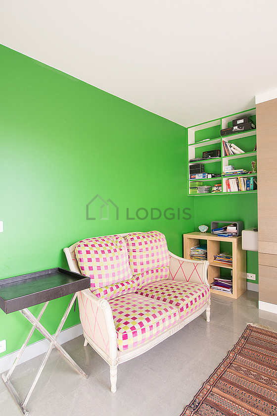 Bedroom with windows facing the road