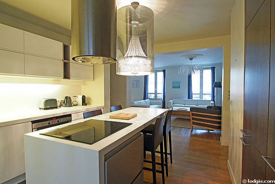 Kitchen where you can have dinner for 2 person(s) equipped with washing machine, refrigerator, extractor hood, stool