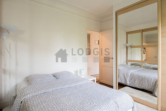 Bedroom with double-glazed windows facing the courtyard