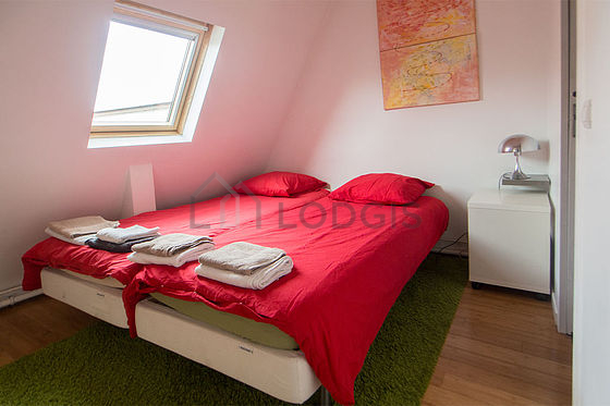 Bedroom with windows facing the courtyard