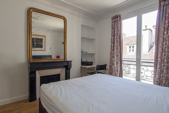 Bedroom with wooden floor