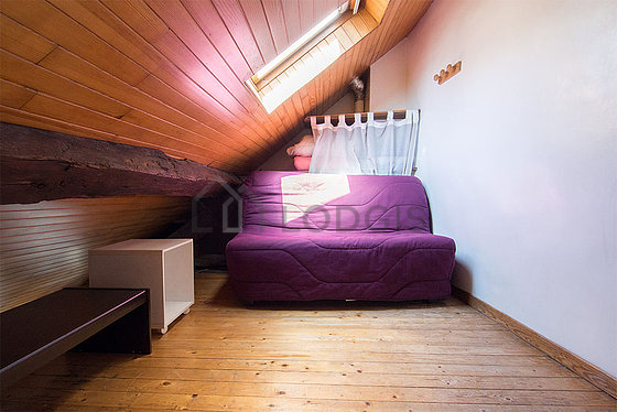 Bedroom with wooden floor