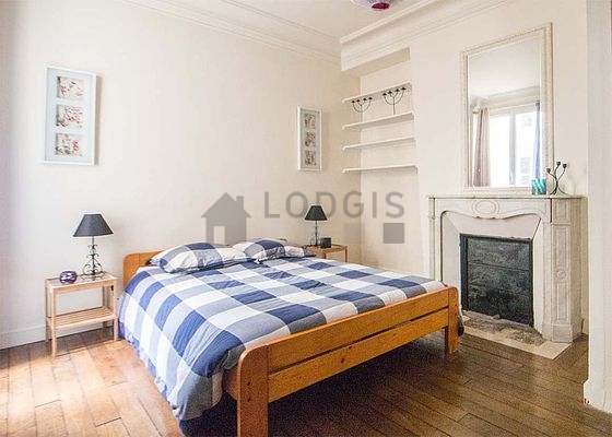 Bedroom with wooden floor