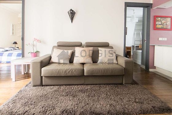 Living room with double-glazed windows facing the courtyard
