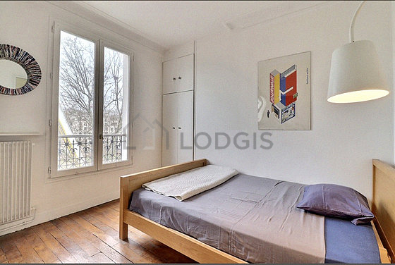 Bedroom with wooden floor