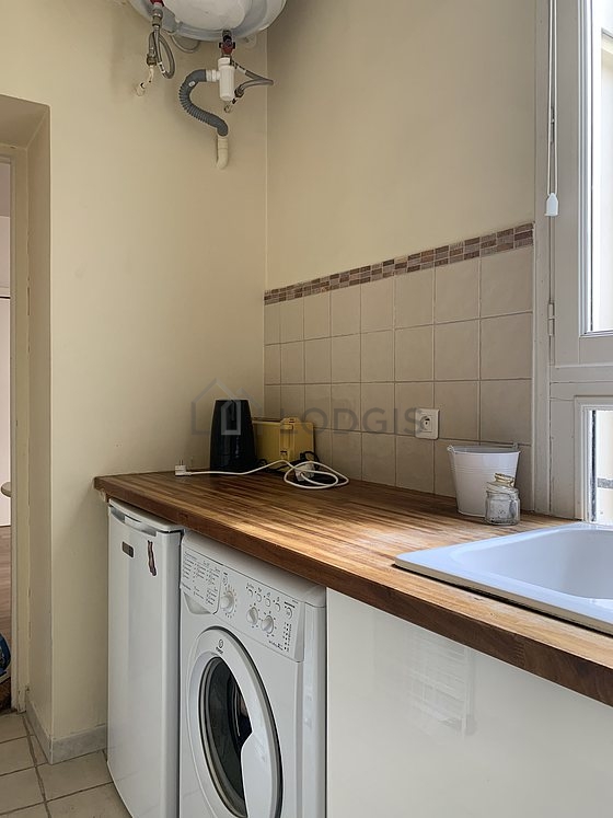Bright kitchen with windows facing the courtyard